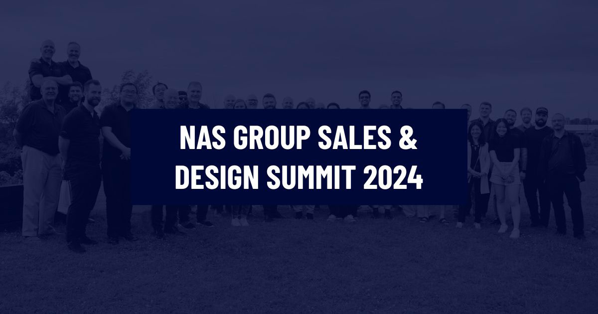 A large group of North American Steel employees posing together at the NAS Group Sales & Design Summit 2024 corporate gathering.